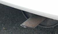 damaged muffler top